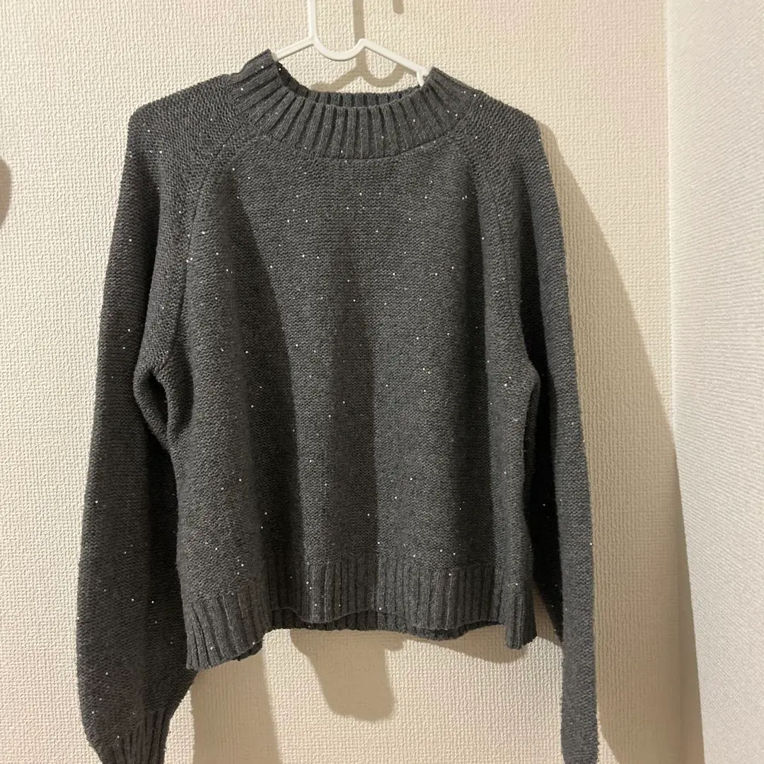 Thumbnail of Gray long-sleeved sweater with glitter