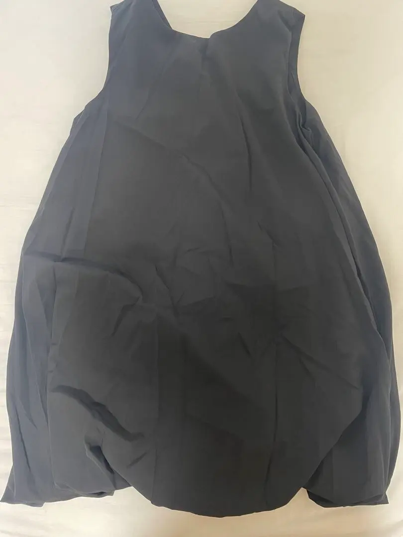 Thumbnail of Black sleeveless above-the-knee dress