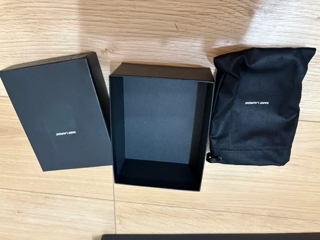 Thumbnail of Yves Saint Laurent gift box and drawstring bag