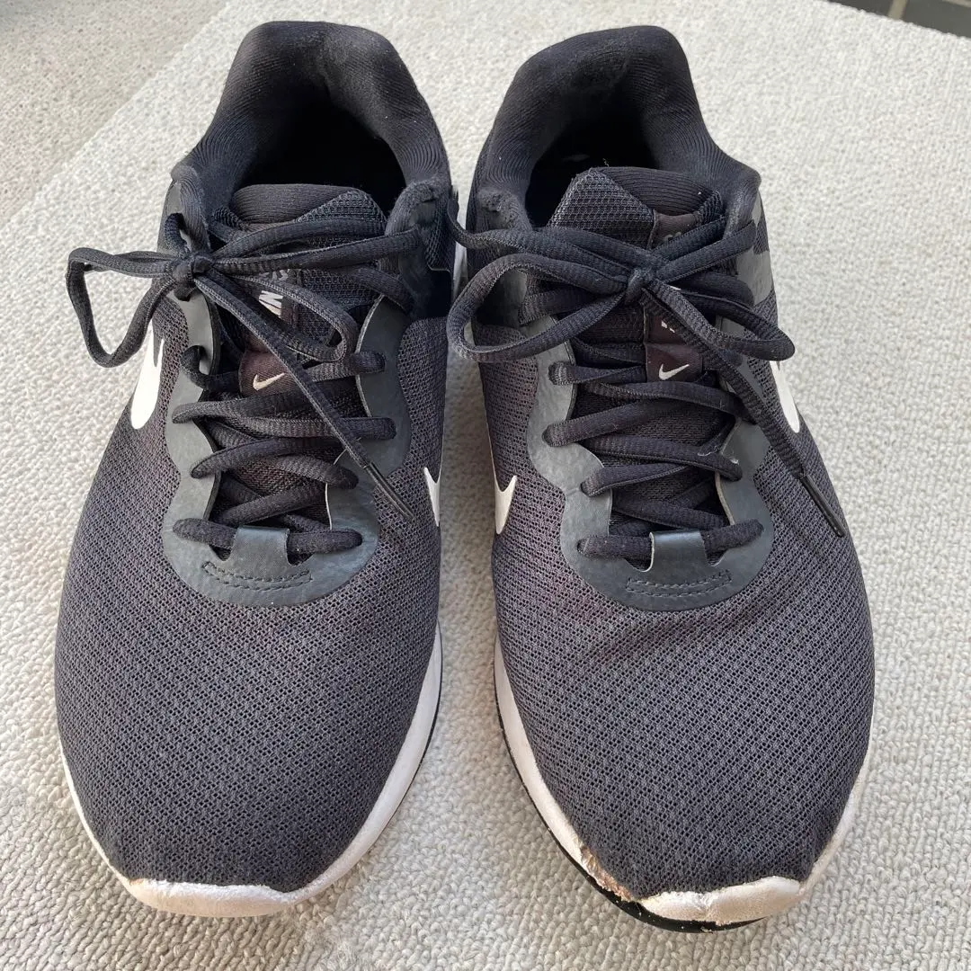 Thumbnail of Nike black running shoes