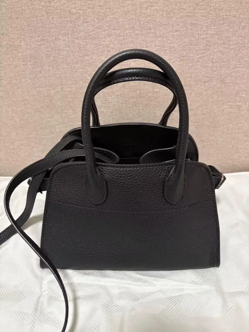 Thumbnail of The Row black leather mini shoulder bag