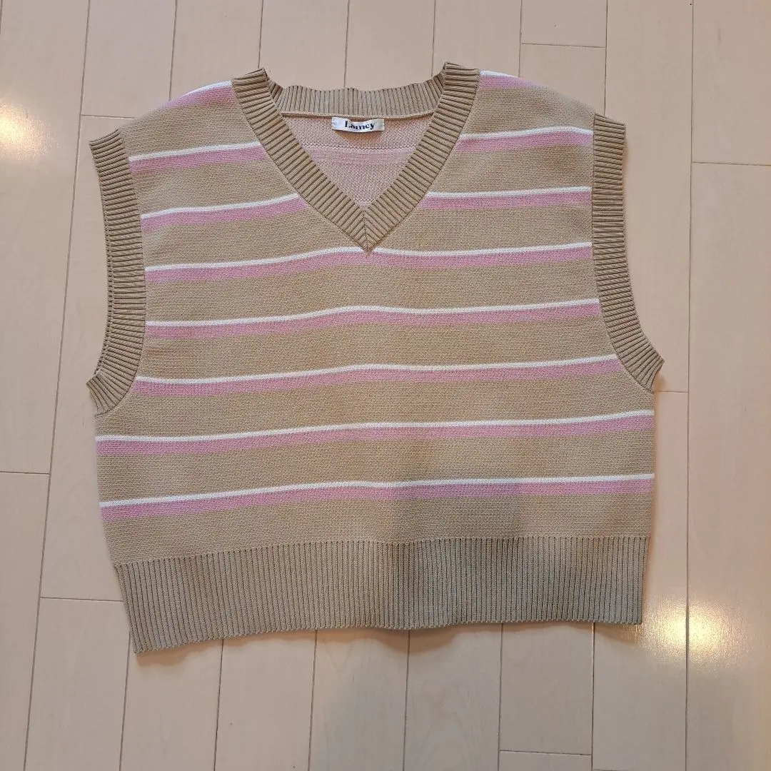Thumbnail of Beige and pink striped V-neck vest