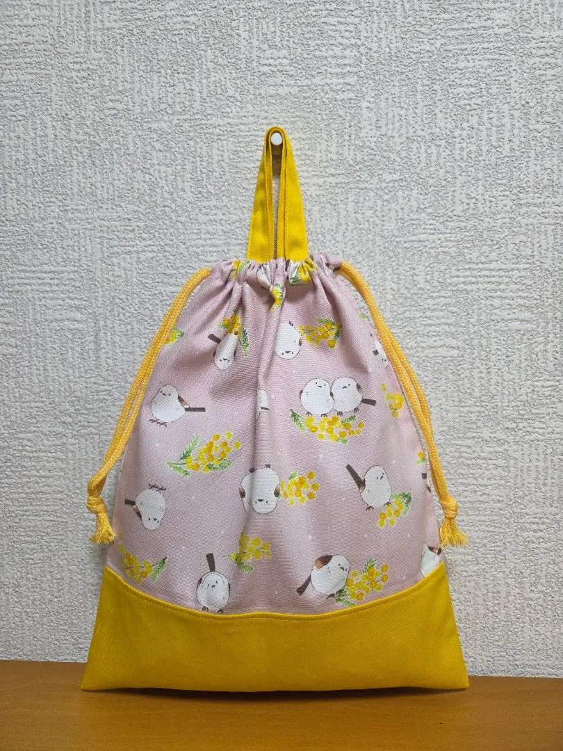 Thumbnail of Drawstring bag with handle, upper school shoes bag, supplies bag, pink long-tailed tits and mimosa pattern x yellow