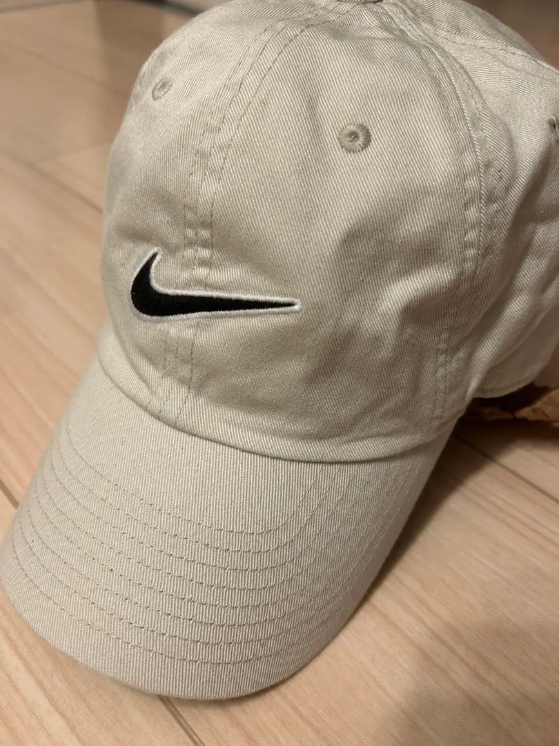 Thumbnail of Nike beige cap hat
