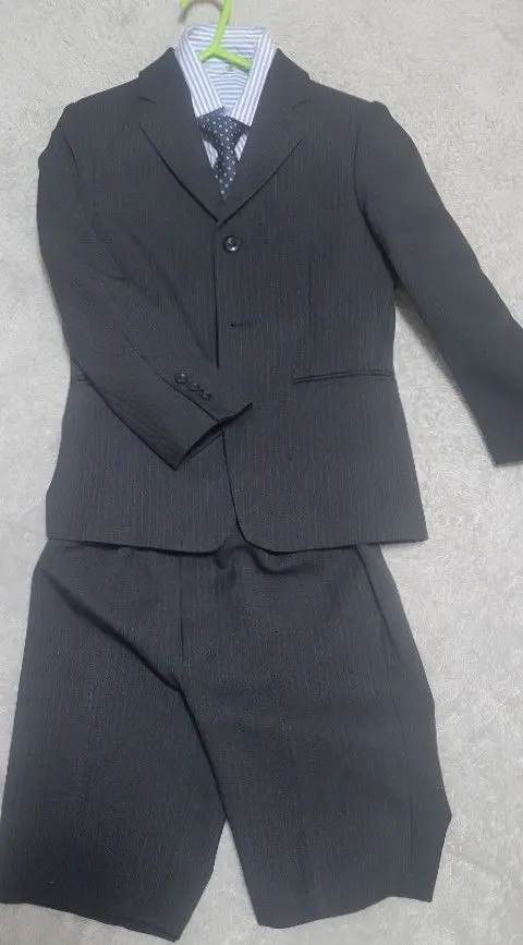 Thumbnail of Formal suit, dark gray, striped shirt