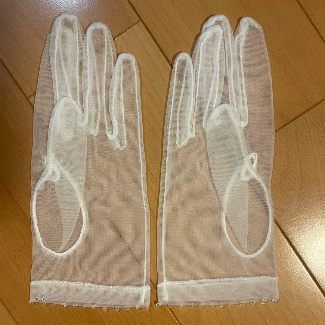 Thumbnail of White wedding gloves with beads