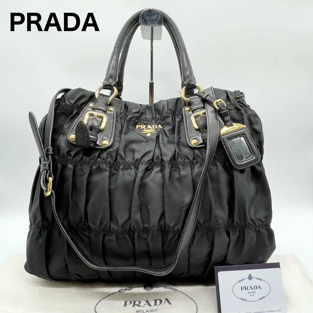 【美品✨】プラダ　ハンドバッグ　ギャザー　三角ロゴ　ゴールド金具　ナイロン　黒 美品 PRADA プラダ ハンドバッグ 三角ロゴプレート ミニボストン