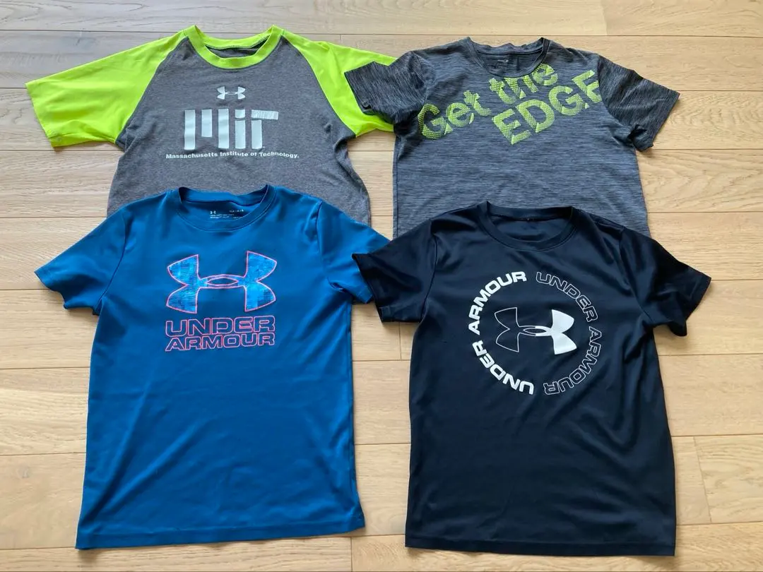 Thumbnail of Set of 4 Under Armour and other T-shirts, sizes 140-150