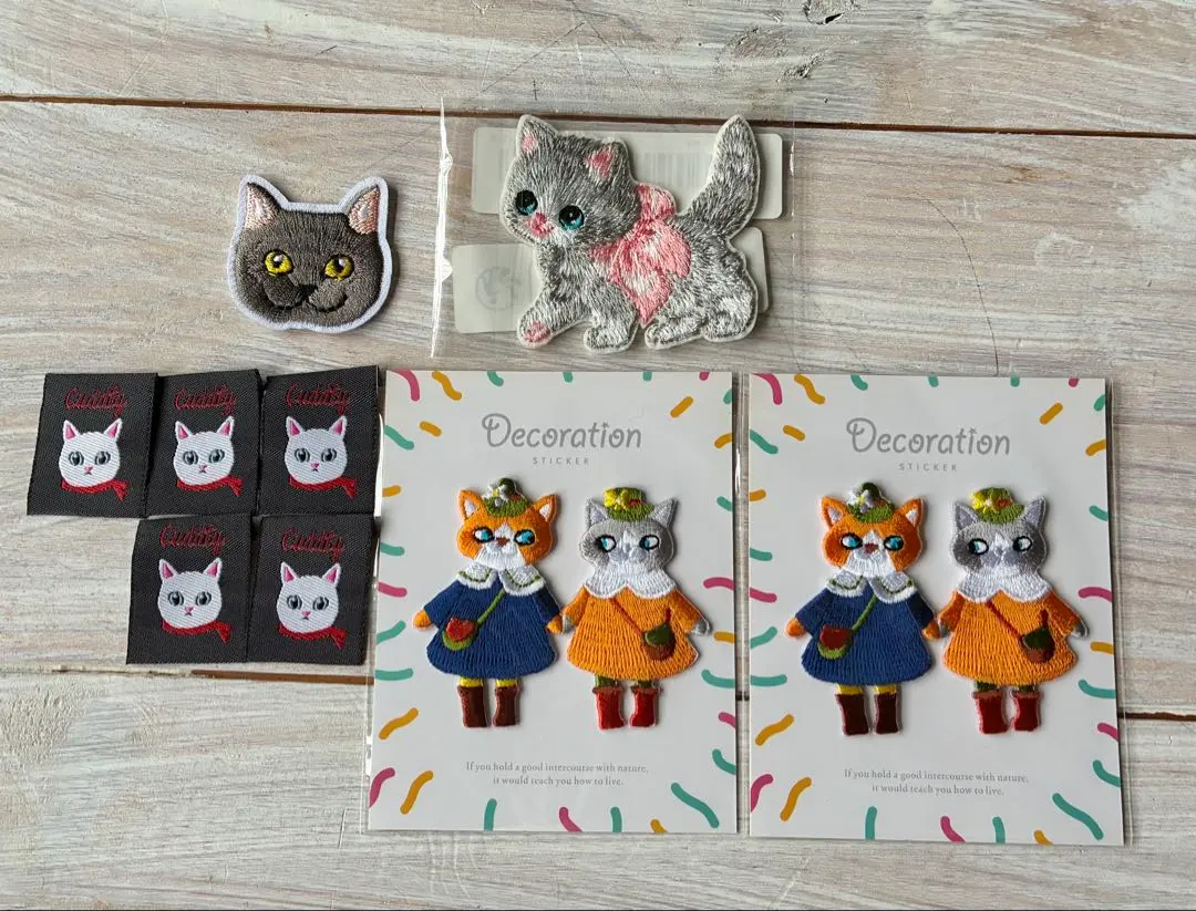 Thumbnail of Set of 9 embroidered cat patches and tags