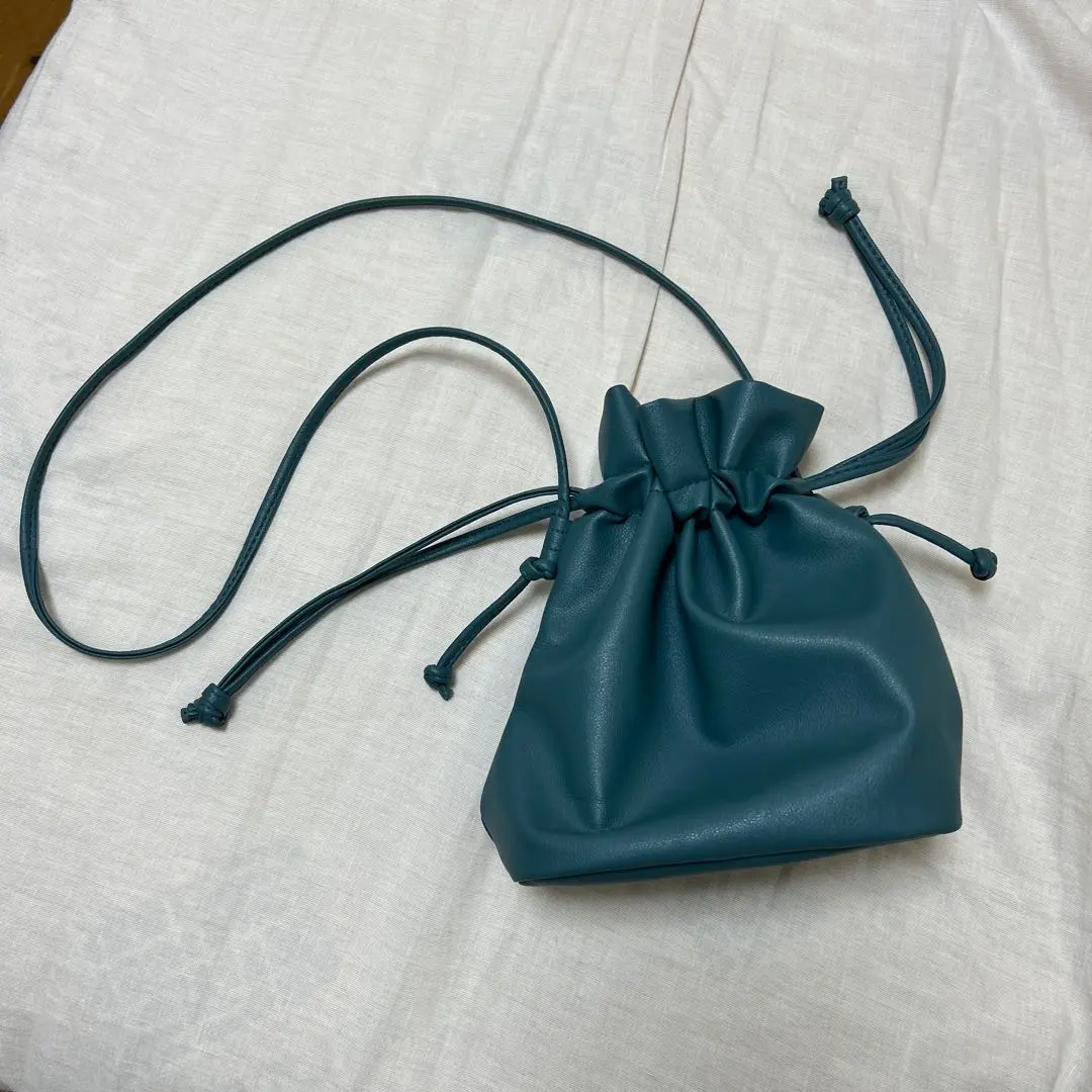 Thumbnail of Dark green drawstring shoulder bag