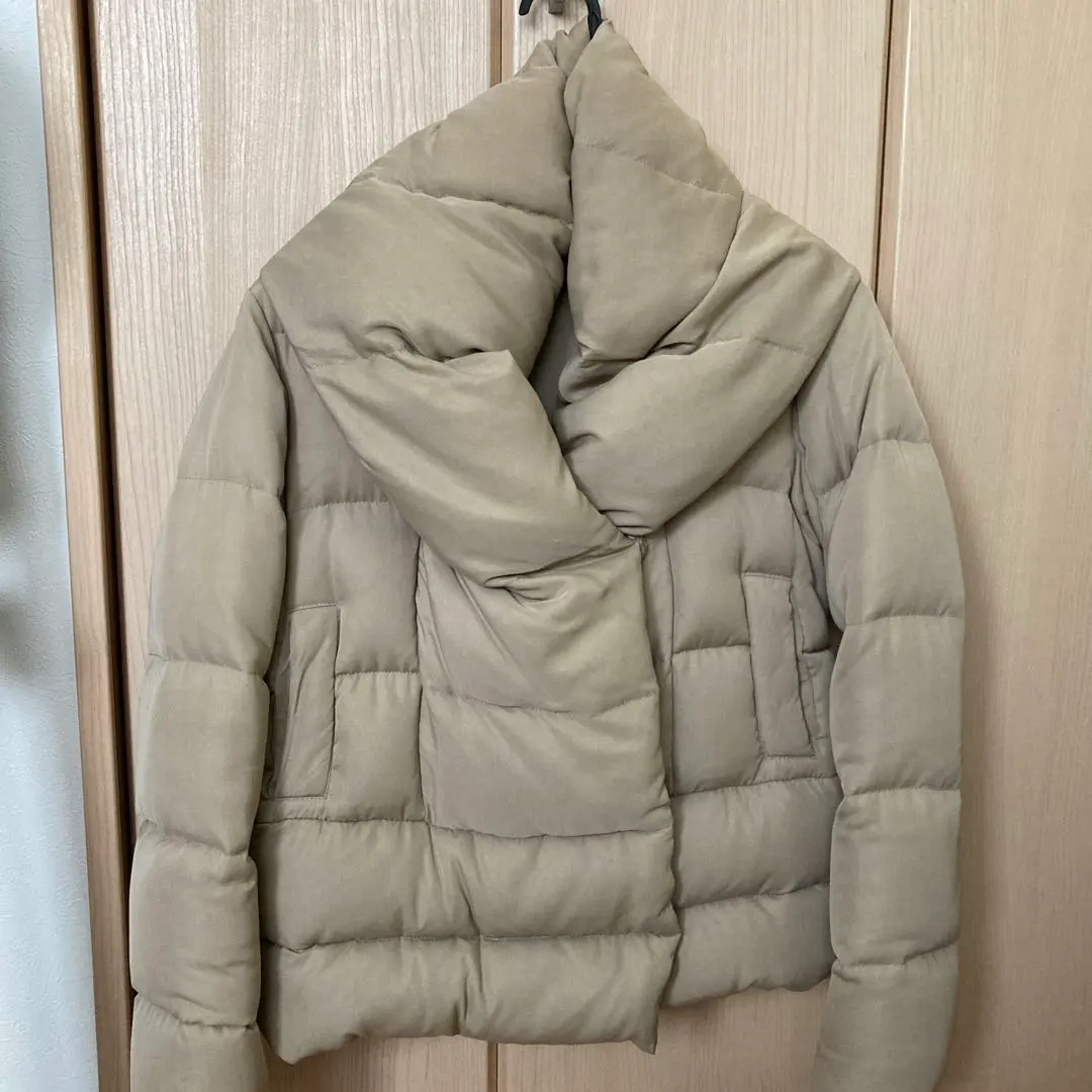 Thumbnail of Beige down jacket coat outerwear