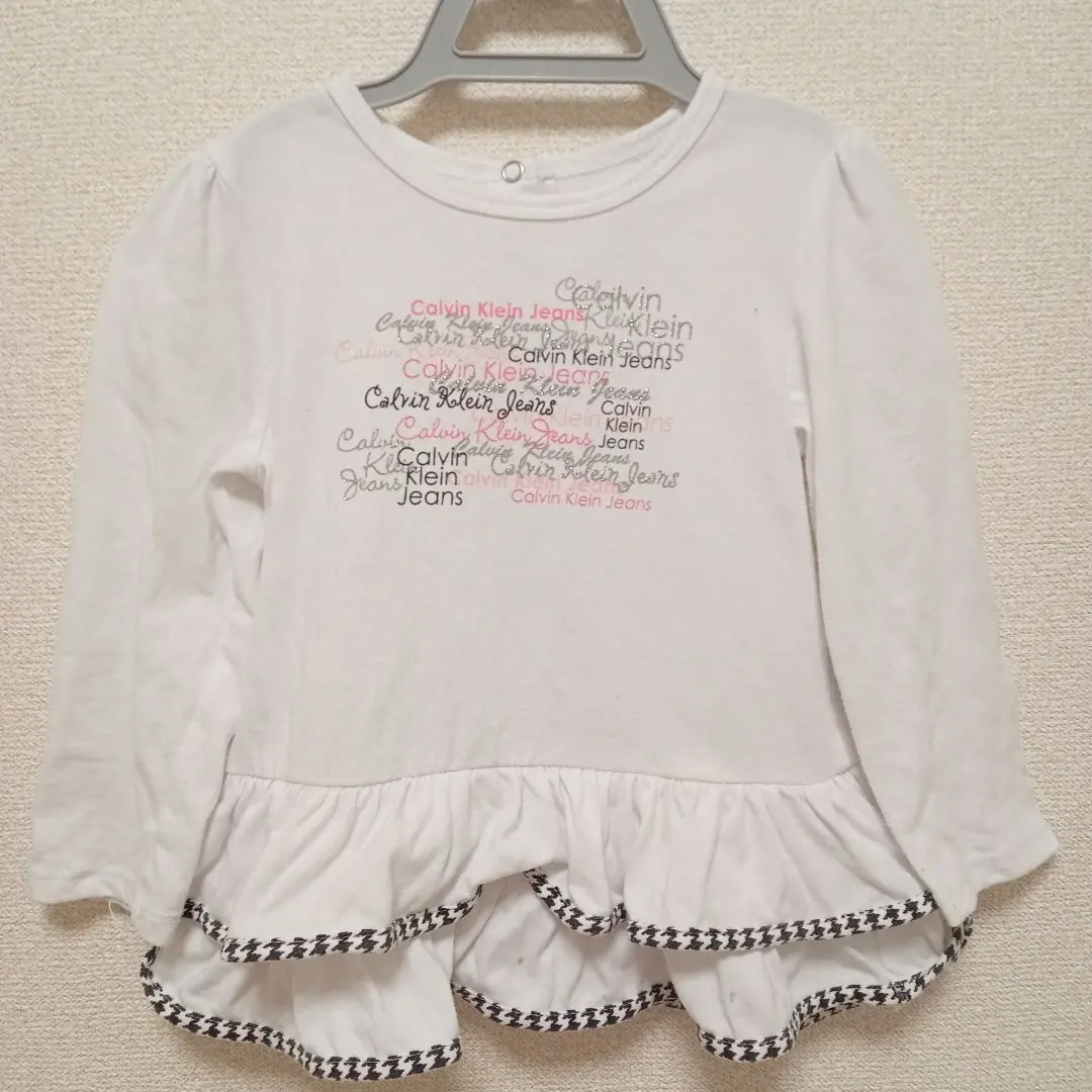 Thumbnail of Calvin Klein Jeans 24-month long-sleeved T-shirt with frill hem, size 90