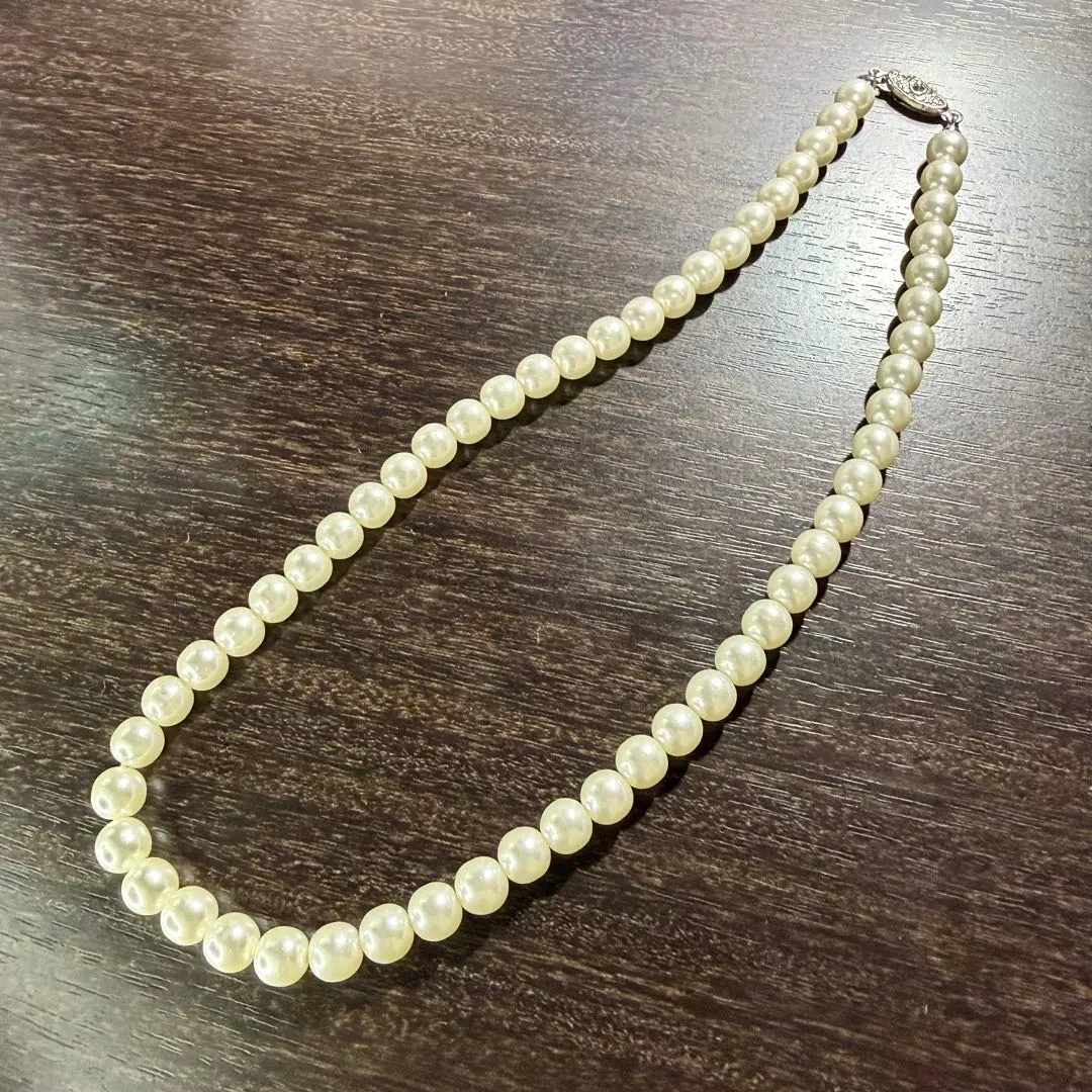 Thumbnail of Pearl-style necklace, for weddings, funerals, and other formal occasions; imitation pearls