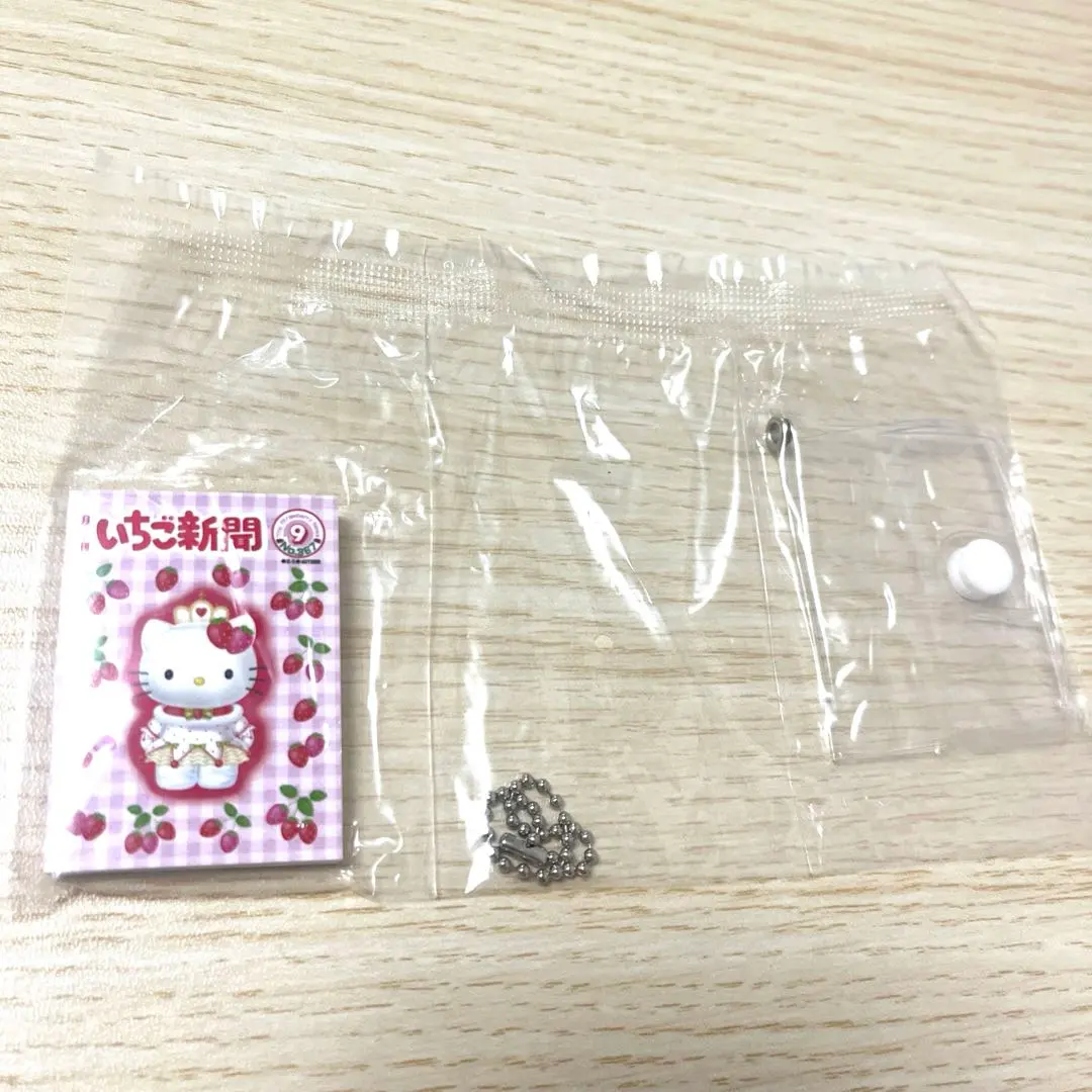 Thumbnail of Ichigo Shinbun (Strawberry Newspaper) miniature gashapon (capsule toy) notebook, Hello Kitty