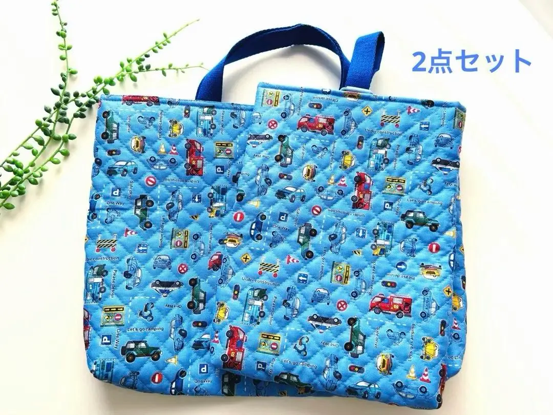 Thumbnail of Two-piece entrance set: Lesson bag, indoor shoes, quilted, car, fire truck, light blue, for boys