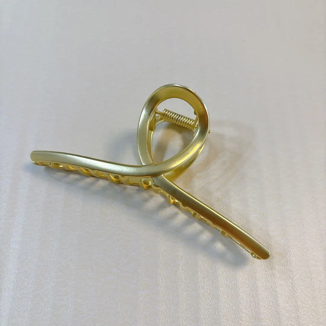 Thumbnail of Hair clip, banana clip, gold, hair accessory, hair ornament, simple, stylish