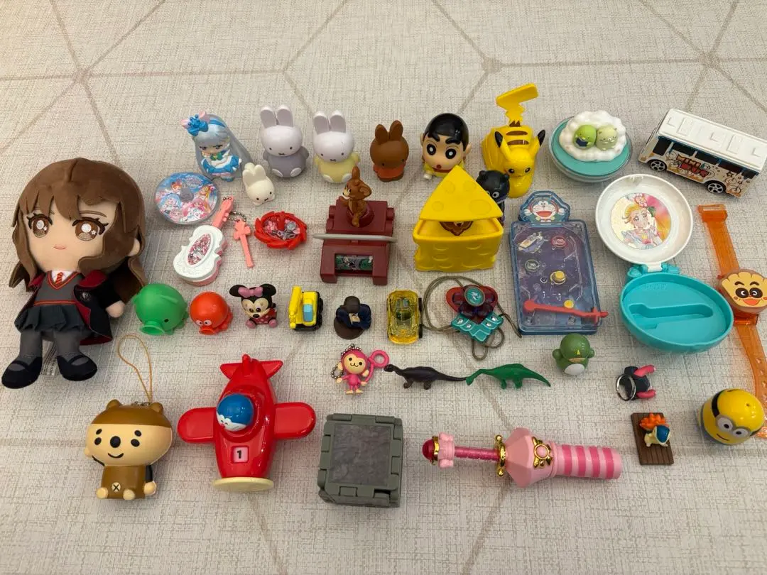 Thumbnail of Various toy sets, finger puppets, Happy Meal toys, Hermione, keychains
