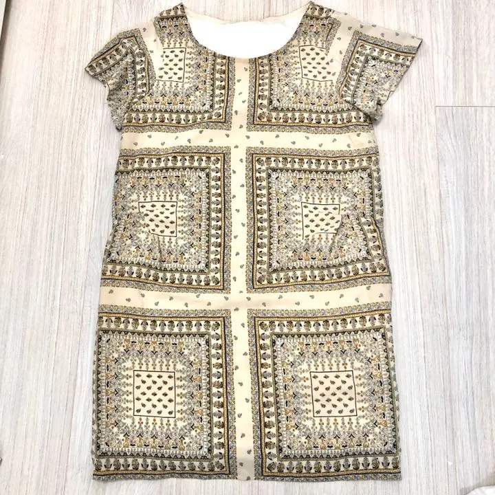 Thumbnail of A stylish dress with a nostalgic pattern