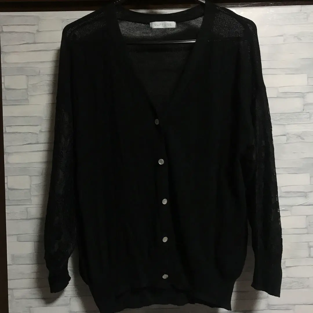 Thumbnail of Black cardigan, autumn