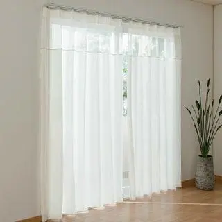 Thumbnail of White lace curtains
