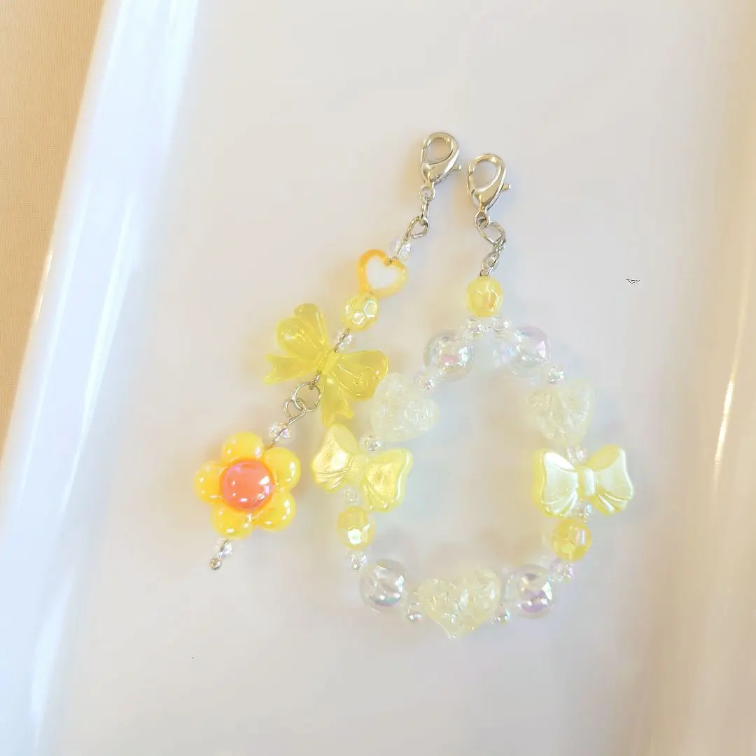 Thumbnail of Tamagotchi Bead Charm Strap, No. 105, Yellow-toned, Flower Ribbon