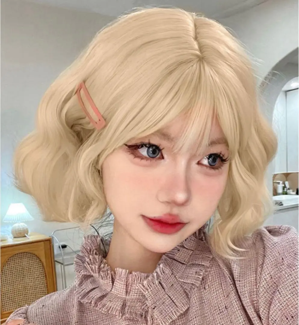 Thumbnail of Blonde wig, blunt bangs, curls, waves, perm, platinum color, cute hair