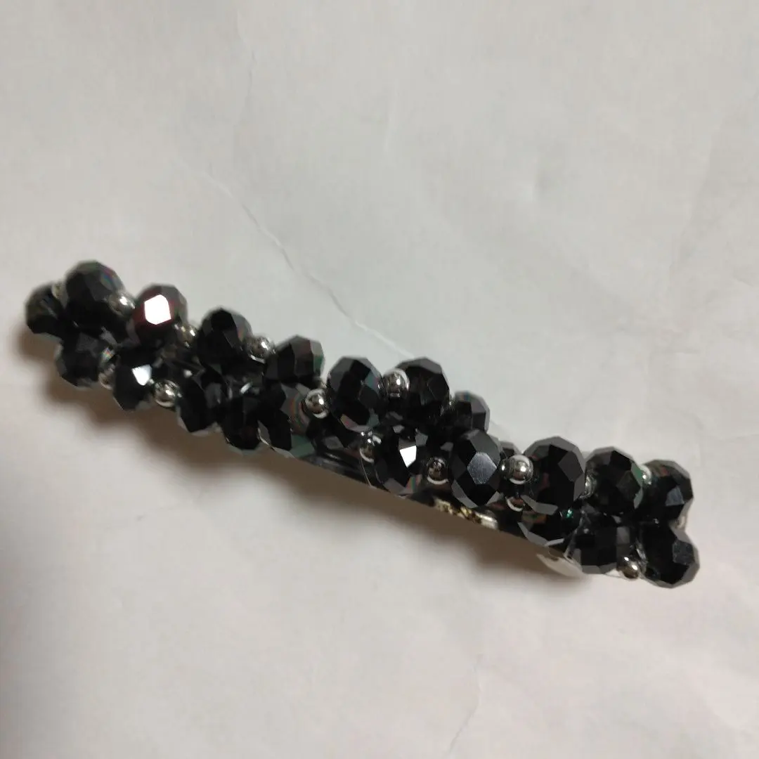 Thumbnail of Black hair pin with jewels, approximately 8cm