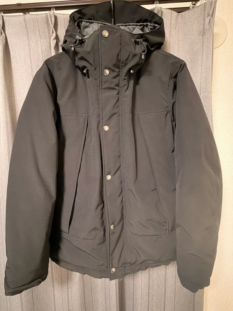 Thumbnail of Black down jacket with hood