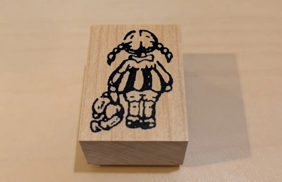 Thumbnail of Girl and Stuffed Animal Wooden Stamp PEPIN Paper Expo vol. 11
