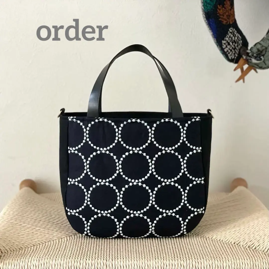 ⚮̈ミナペルホネン tambourine navy 圓滾滾捉迷藏托特包 的縮圖