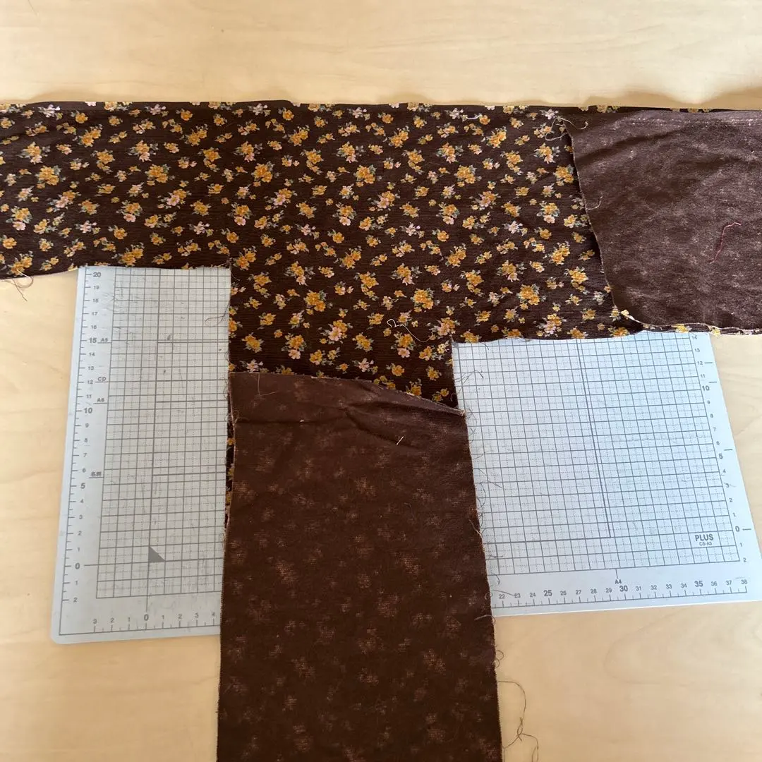 Thumbnail of Scraps of fabric, floral corduroy, brown