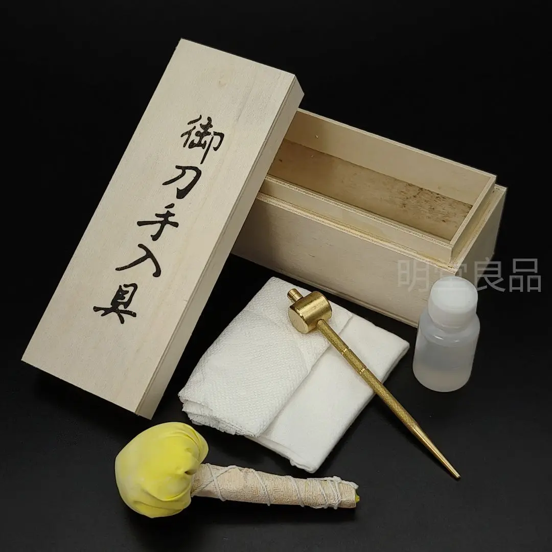 Thumbnail of Japanese sword maintenance tools: sword care kit - sword oil, polishing powder, mekugi-nuki (peg remover), wiping paper, oil cloth - 5 items