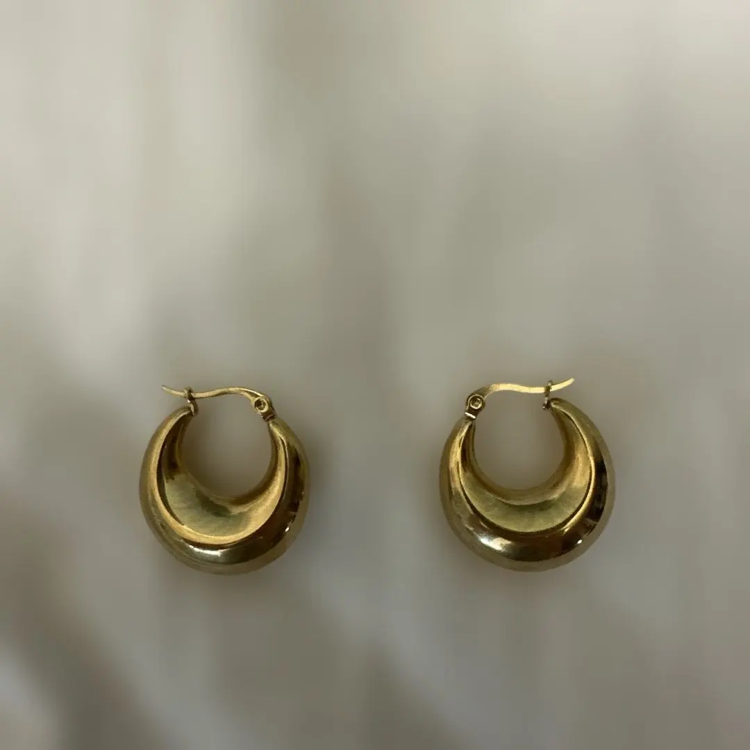 Thumbnail of Gold hoop earrings, simple