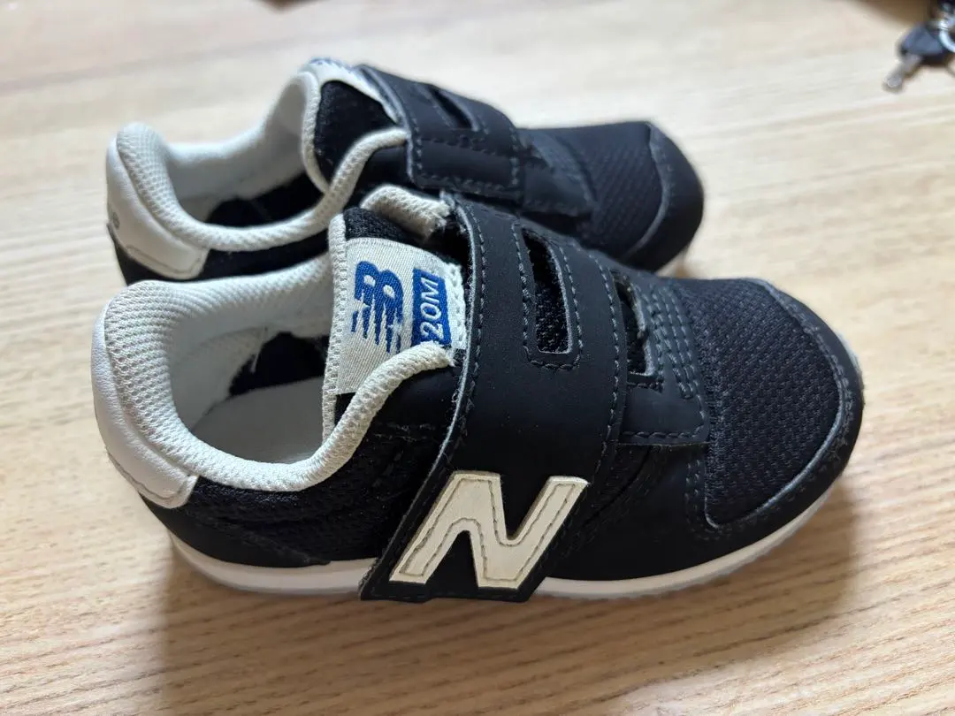 Thumbnail of Excellent condition New Balance 420M black baby shoes, 14.5cm