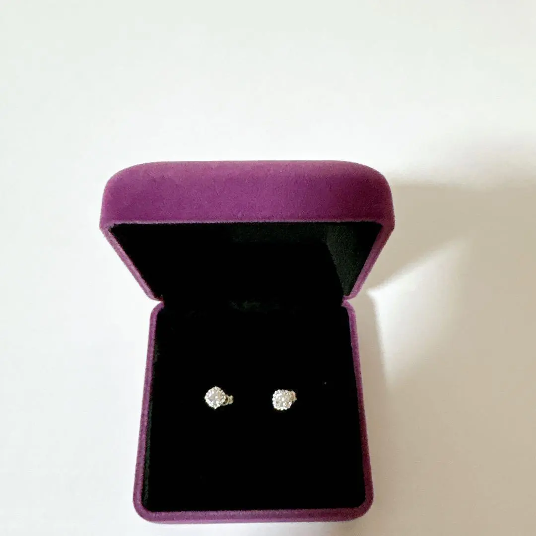Thumbnail of Brand new, unused round cut earrings with box