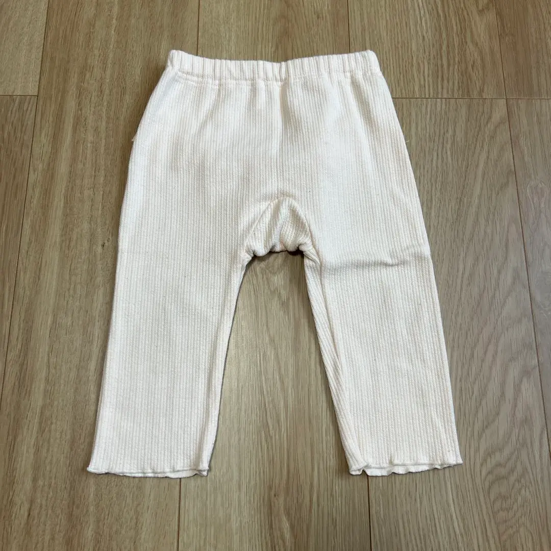 Thumbnail of Cream-colored pants with frills, size 80