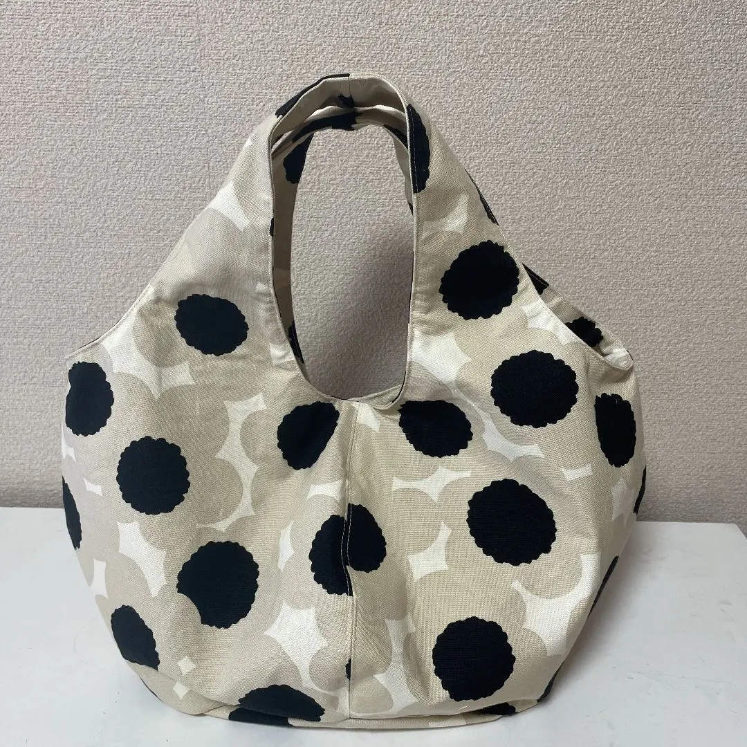 手工製作 圓滾滾包 包底圓形 北歐風 花紋 米色 的縮圖