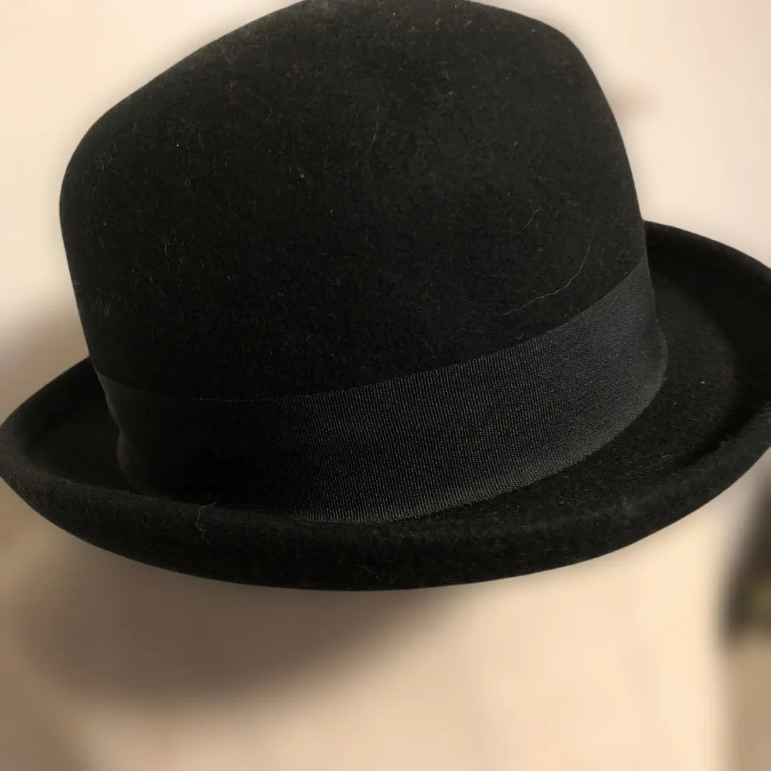 Thumbnail of Wool felt hat, black, with feather