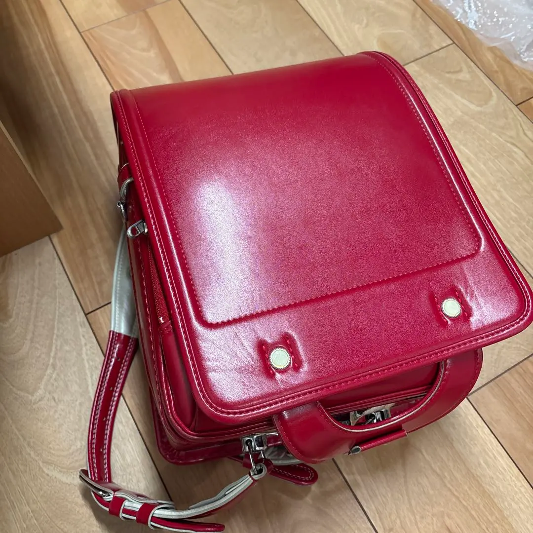 Thumbnail of Red, simple school backpack