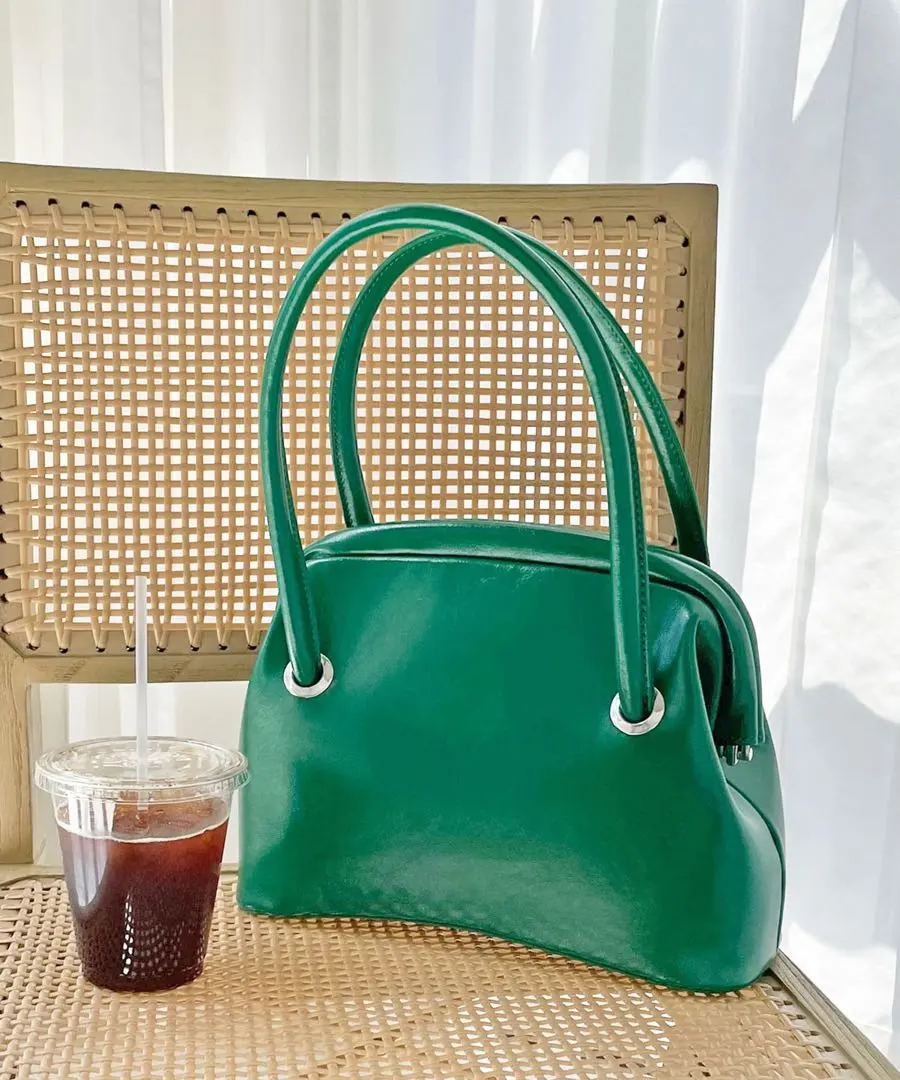 Thumbnail of Excellent Condition: Handbag with a clasp closure