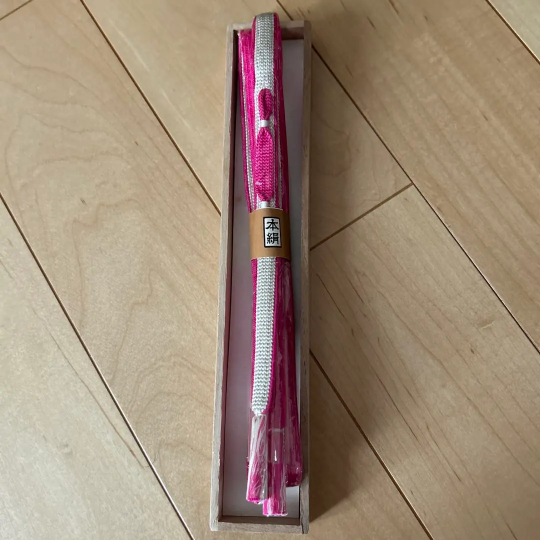 Thumbnail of Brand new, unused, 100% silk pink obijime (decorative belt cord), with box