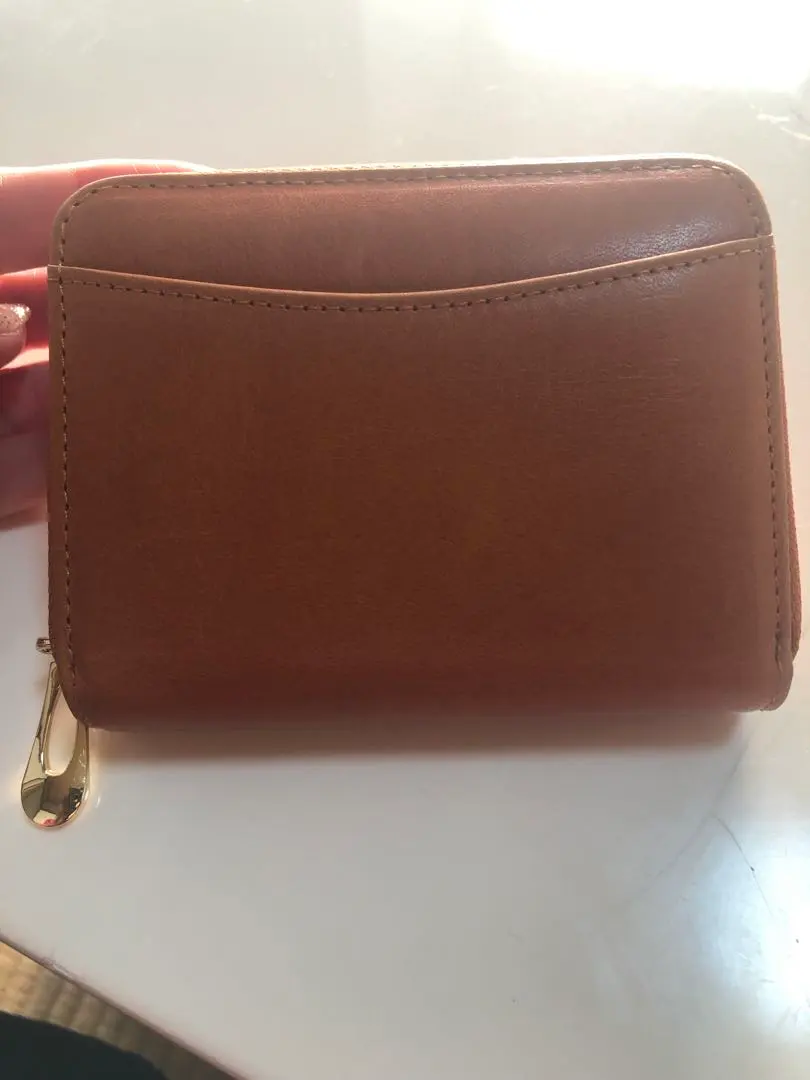 Thumbnail of Genuine leather camel mini wallet that fits bills without folding