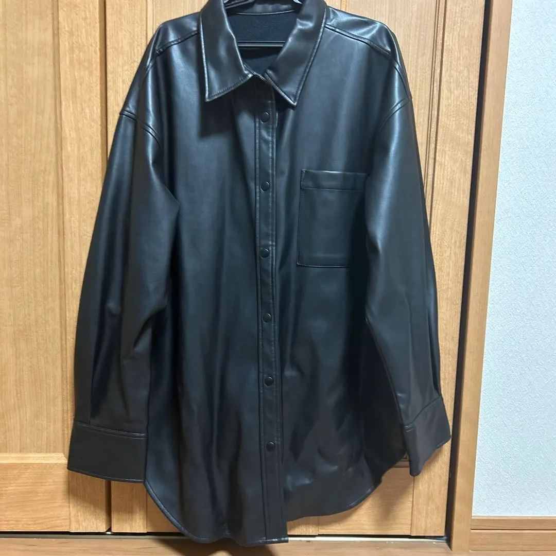 Thumbnail of Black synthetic leather button-up shirt