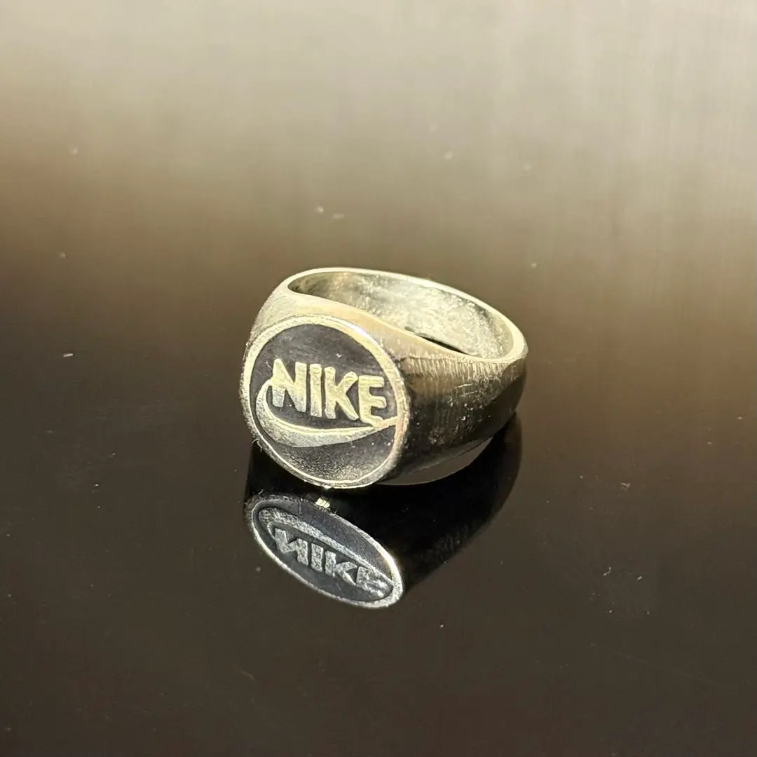 Nikeロゴ入りシルバーリング 指輪 NIKE - nike swoosh リング 指輪の通販 by a｜ナイキならラクマ