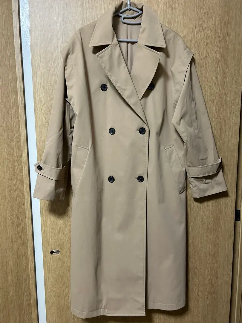 Thumbnail of Beige double-breasted trench coat, sleeveless