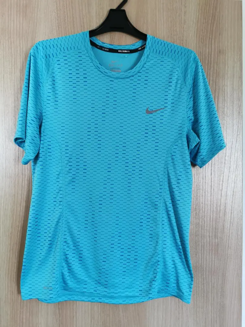 Thumbnail of Nike T-shirt, size M
