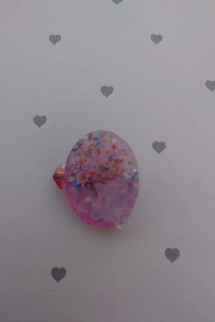 Thumbnail of Pink resin brooch, clip-on type