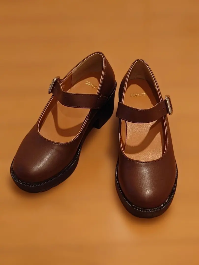 Thumbnail of Brown strap pumps