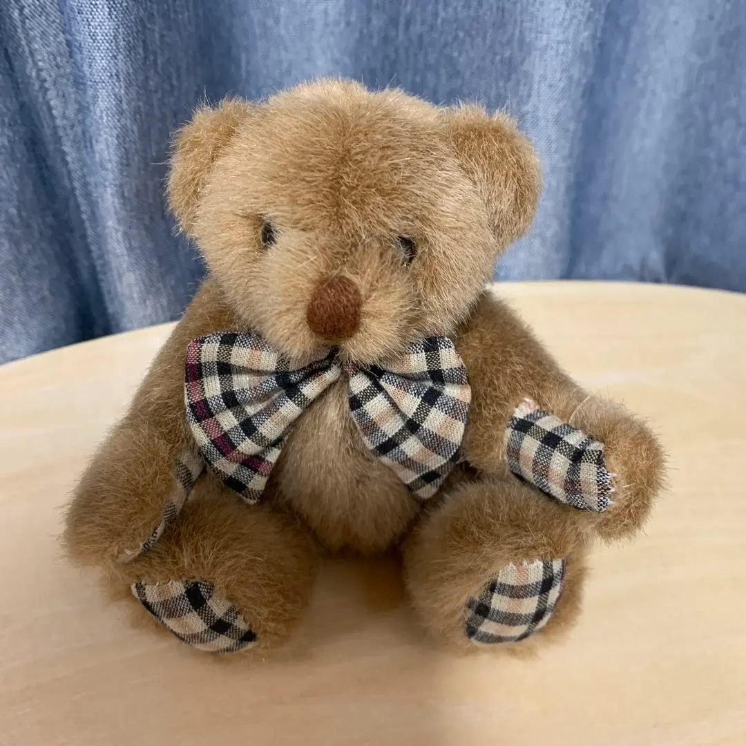 Thumbnail of A cute teddy bear plushie with movable limbs