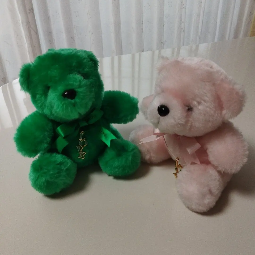 Thumbnail of Set of two stuffed animals with ribbons and LOVE charms, green and pink